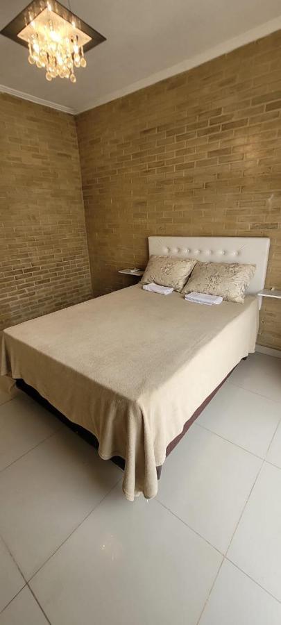 Sobrado 2 Amplo E Confortavel Em Condominio Corumbá Eksteriør bilde